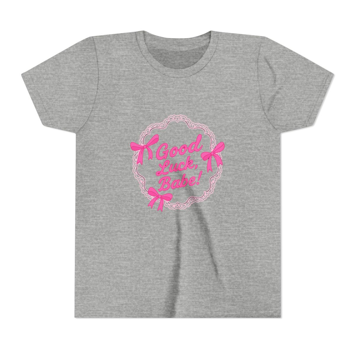 Orchid-coloured T Shirt featuring a cake graphic with pink bows and the text "Good Luck, Babe!". The shirt is made of a soft material and is suitable for casual wear (Kids) - alternate angle 3, merchandise